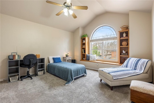 bedroom featuring ceiling fan, carpet, and vaulted ceiling