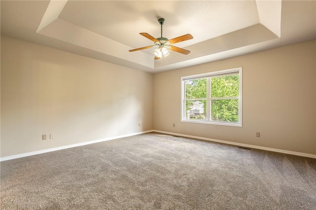 3 Barrhead Ln, Bella Vista, AR 72715 - carpeted spare room featuring a ceiling fan, visible vents, baseboards, and a raised ceiling