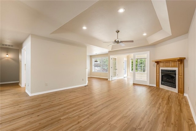 3 Barrhead Ln, Bella Vista, AR 72715 - unfurnished living room featuring light wood finished floors, baseboards, a ceiling fan, and visible vents