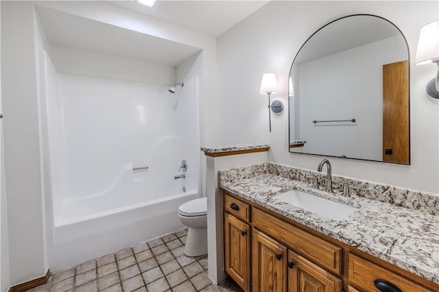 full bathroom featuring shower / washtub combination, vanity, and toilet