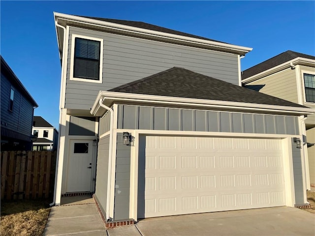 front facade with a garage