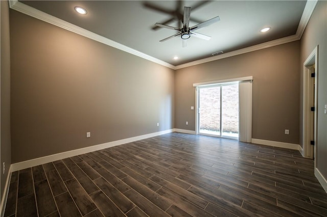 spare room featuring ceiling fan, dark hardwood / wood-style flooring, and crown molding