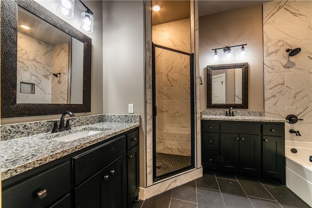 bathroom with vanity and independent shower and bath