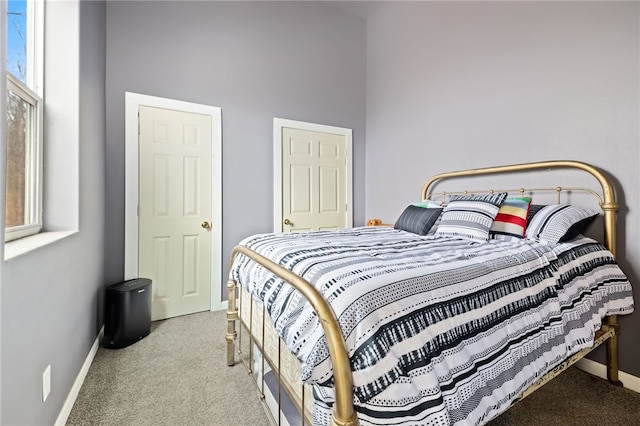 19959 Rheas Community Rd, Lincoln, AR 72744 - carpeted bedroom with a high ceiling and baseboards