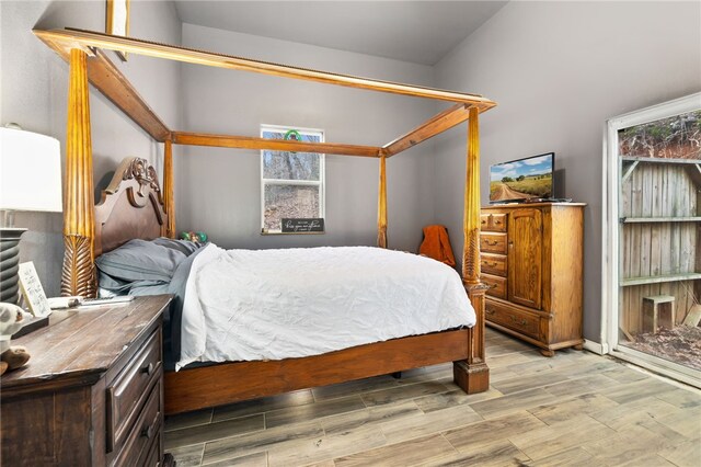 bedroom with light wood-type flooring