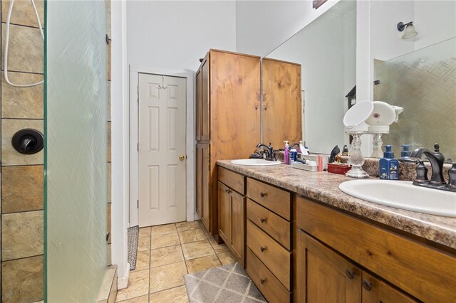 bathroom with vanity and walk in shower