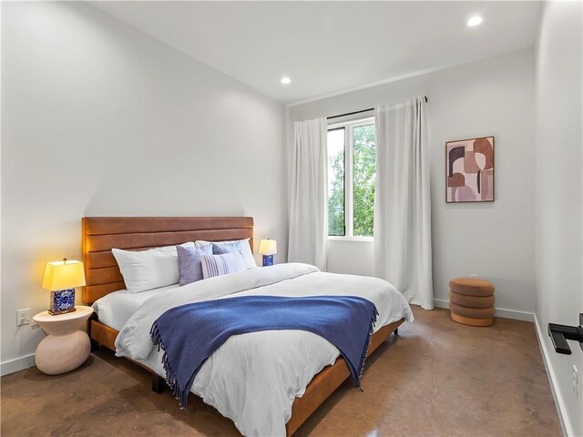 carpeted bedroom with recessed lighting and baseboards