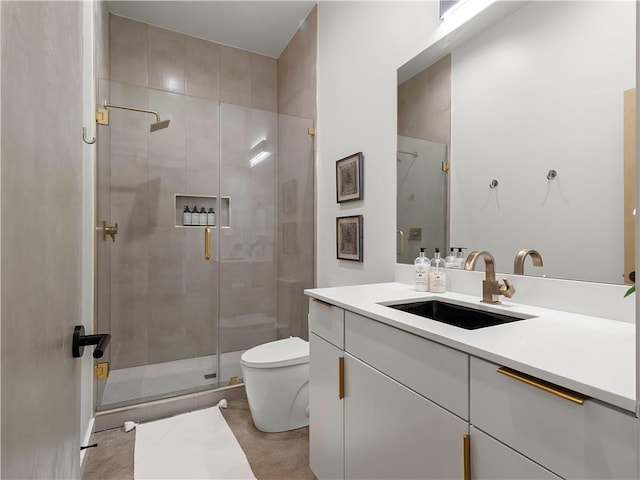 bathroom with vanity, an enclosed shower, tile patterned floors, and toilet