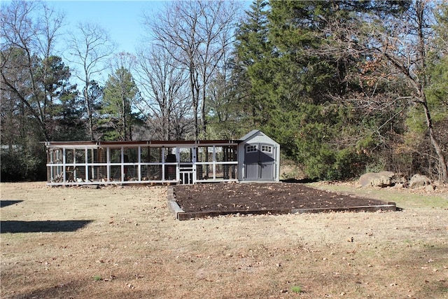 exterior space with a storage shed