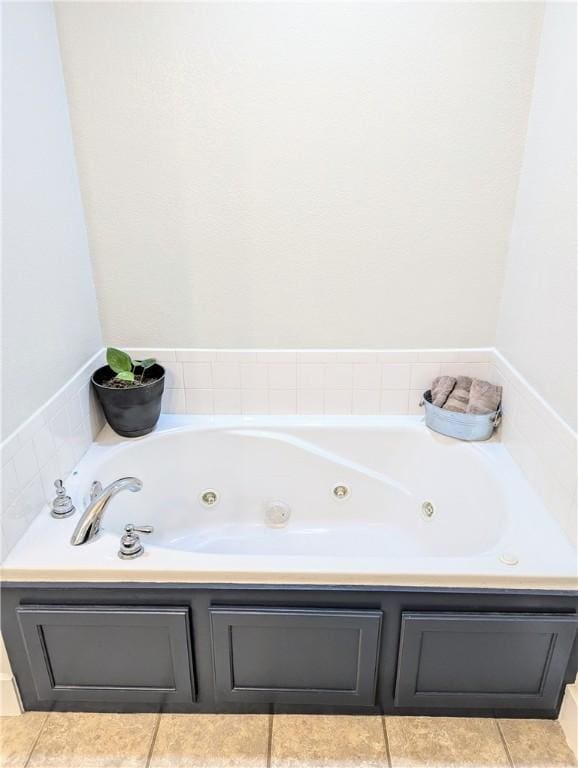 bathroom with a tub to relax in