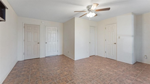 unfurnished bedroom with a ceiling fan