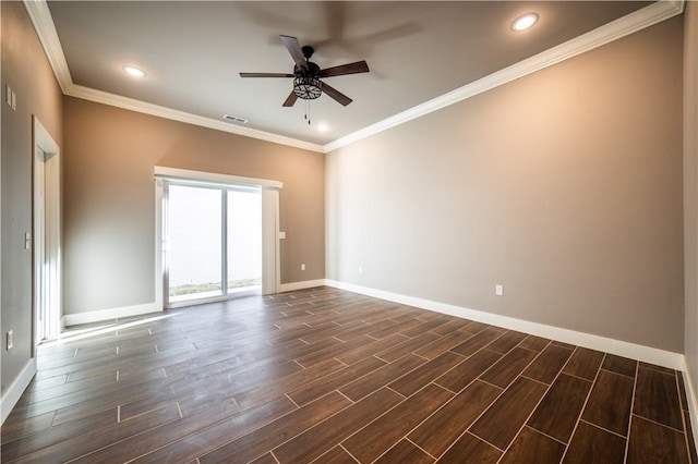 empty room featuring ceiling fan and ornamental molding