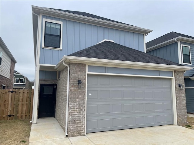 view of front of property with a garage