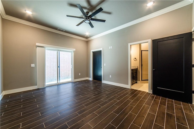 interior space with ceiling fan and crown molding