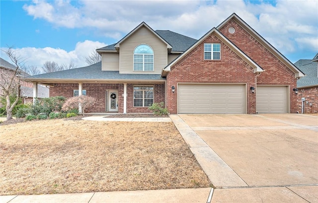 view of front of home with a garage