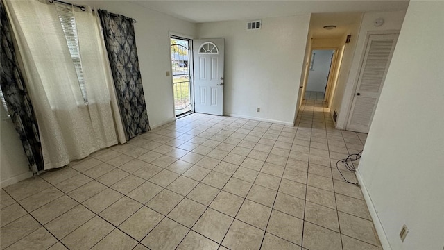 view of tiled spare room