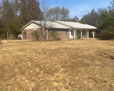 exterior space with a front yard