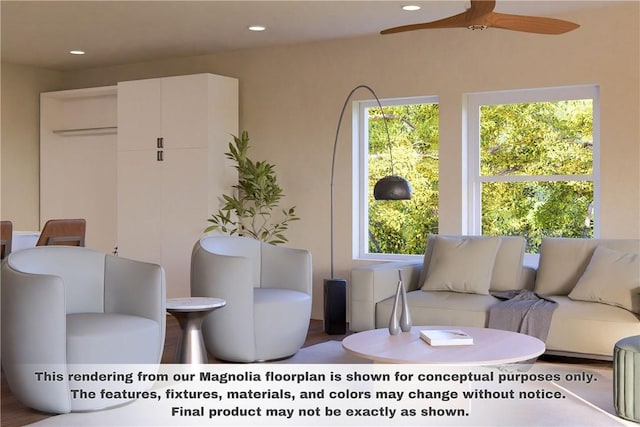 living area featuring plenty of natural light, a ceiling fan, and recessed lighting