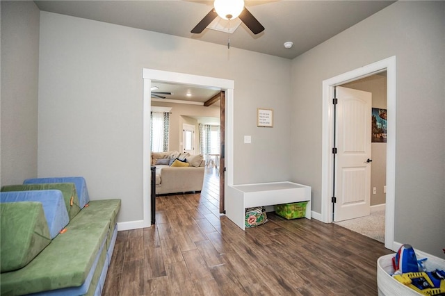 hall with dark hardwood / wood-style flooring