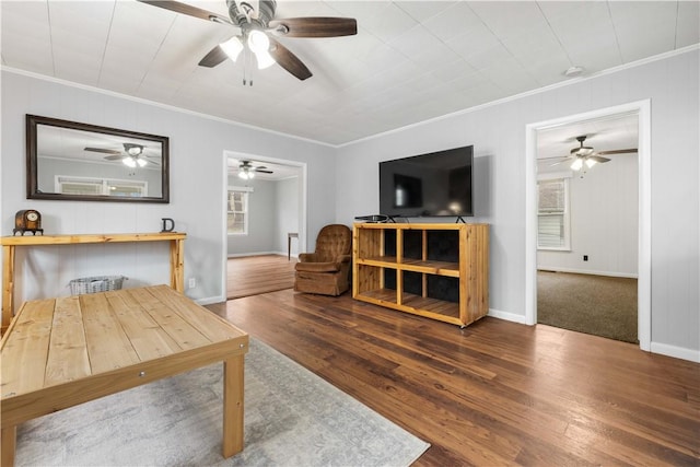 living room featuring ornamental molding and hardwood / wood-style flooring