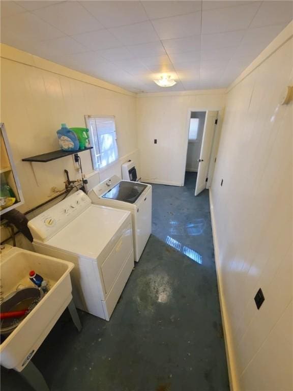 laundry area with washer and dryer and sink