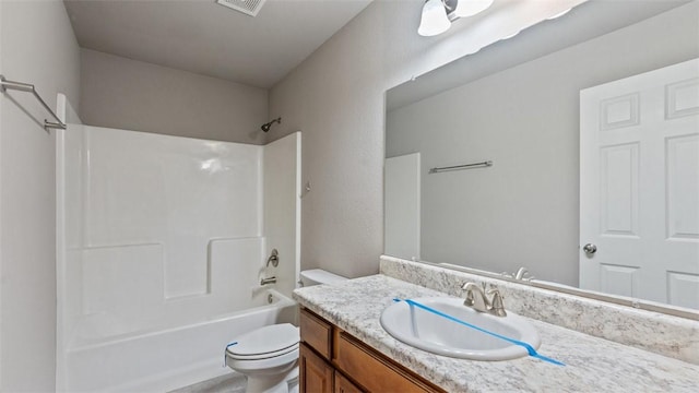 full bathroom with vanity, toilet, and tub / shower combination