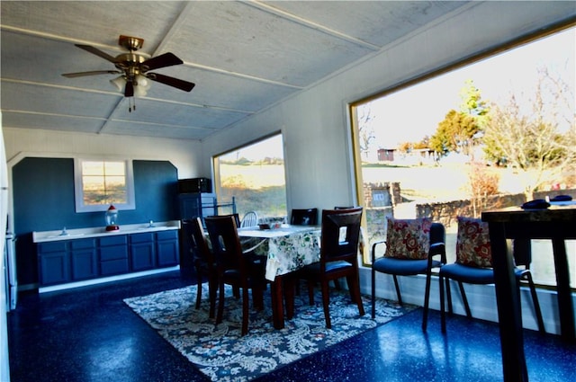 dining space with ceiling fan