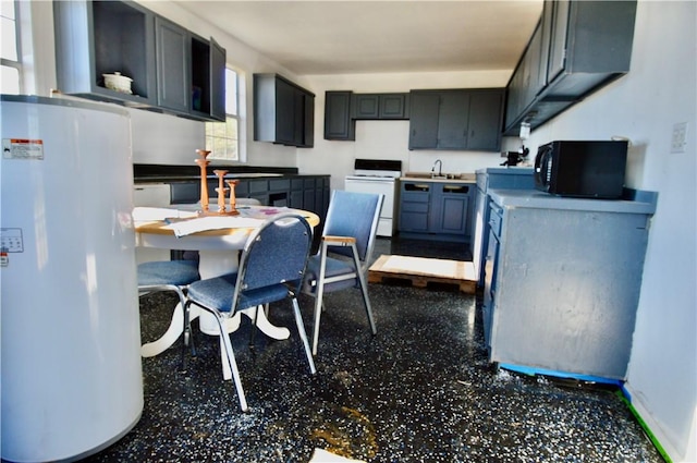 kitchen with white range with electric stovetop, sink, and fridge