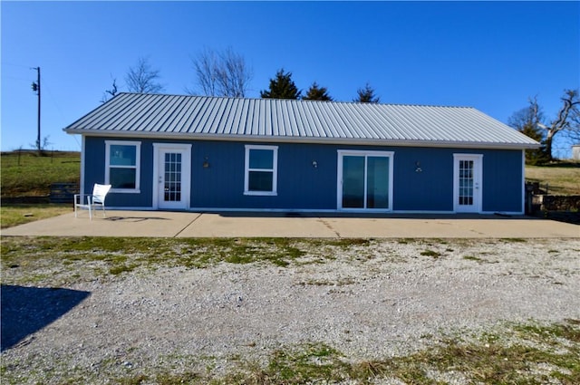 rear view of property with a patio