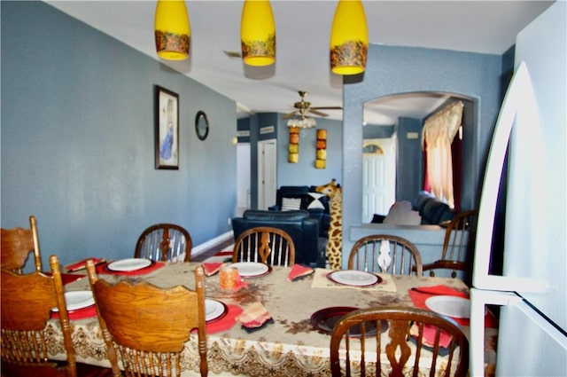 dining area with ceiling fan