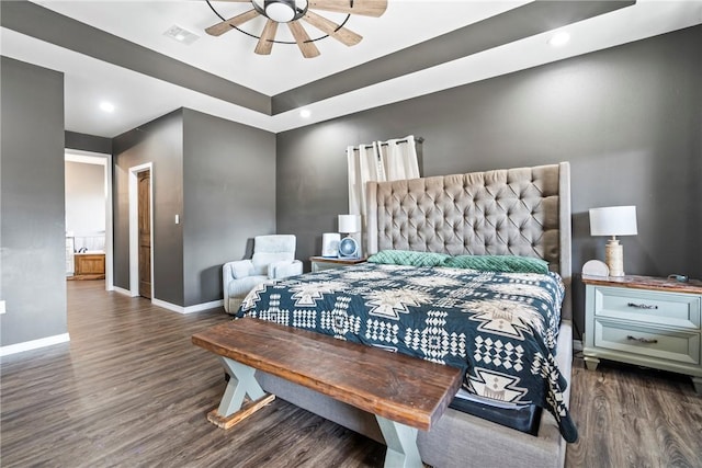 bedroom featuring ceiling fan and dark wood-type flooring