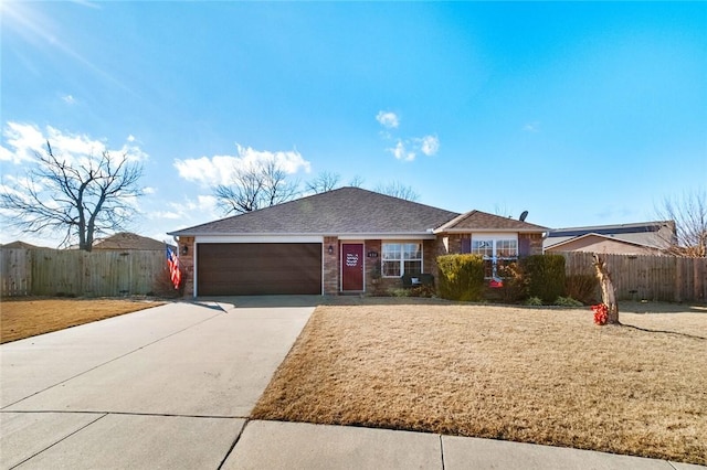 ranch-style home featuring a garage