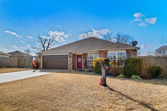 ranch-style home featuring a garage