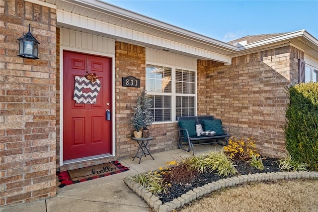 property entrance featuring covered porch