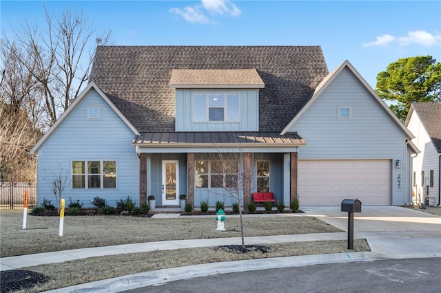 view of front of property with a garage