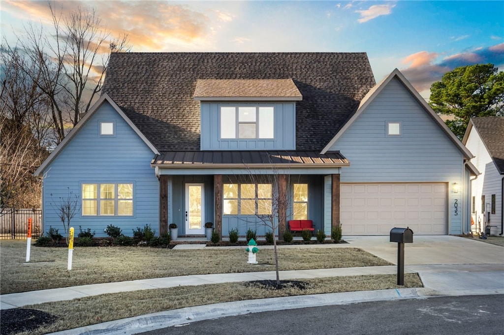 view of front of property with a garage