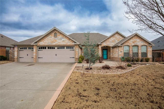 ranch-style house featuring a garage