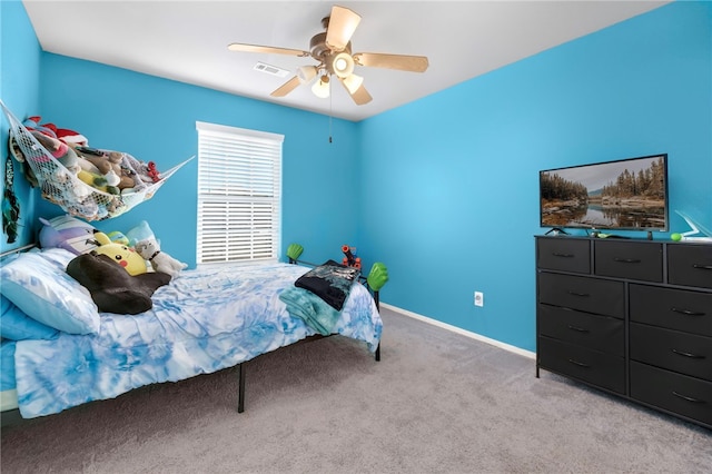 bedroom featuring ceiling fan and light colored carpet