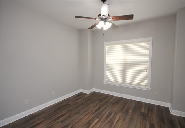 unfurnished room featuring ceiling fan, a healthy amount of sunlight, and dark hardwood / wood-style floors