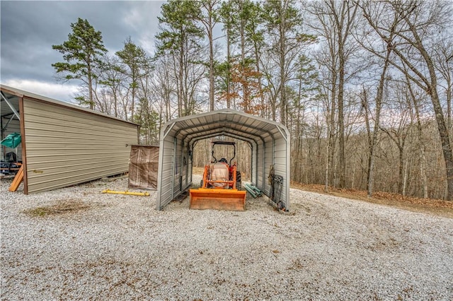 view of outbuilding featuring a carport