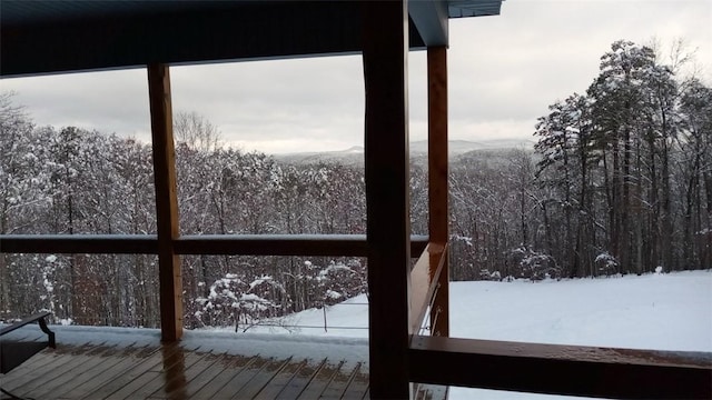 view of snow covered deck