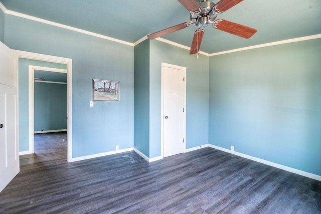 empty room with ceiling fan, crown molding, and dark wood-type flooring