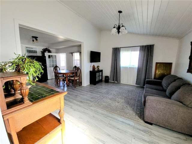 living room featuring a notable chandelier, wooden ceiling, light hardwood / wood-style flooring, and vaulted ceiling