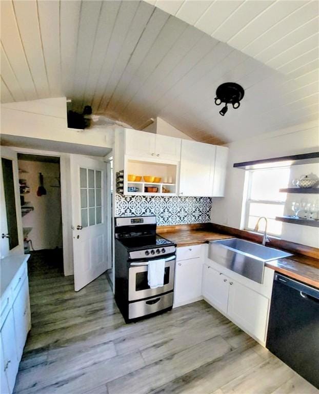 kitchen featuring white cabinetry, stainless steel range, sink, black dishwasher, and decorative backsplash