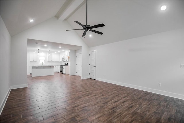 unfurnished living room featuring sink, ceiling fan, high vaulted ceiling, dark hardwood / wood-style flooring, and beamed ceiling