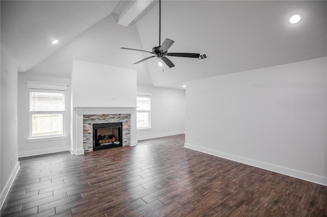 unfurnished living room with high vaulted ceiling, dark hardwood / wood-style floors, beamed ceiling, ceiling fan, and a fireplace