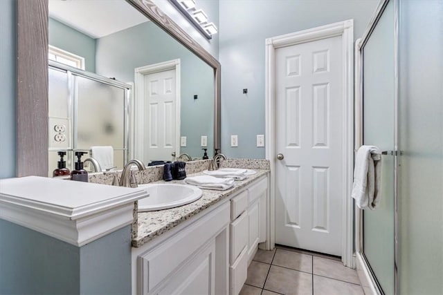 1515/1517 Belle Royal Ct, Bentonville, AR 72712 - bathroom with a stall shower, tile patterned flooring, and double vanity