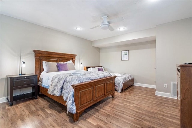 1515/1517 Belle Royal Ct, Bentonville, AR 72712 - bedroom featuring light wood-style floors, baseboards, a ceiling fan, and recessed lighting