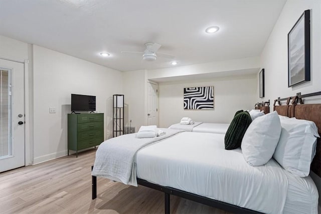 1515/1517 Belle Royal Ct, Bentonville, AR 72712 - bedroom featuring recessed lighting, light wood-style floors, a ceiling fan, and baseboards