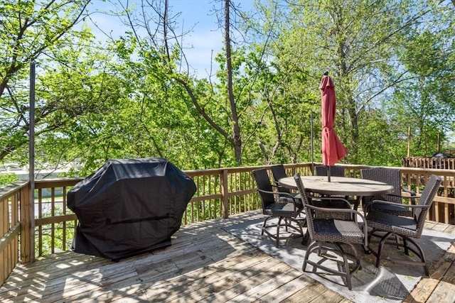 1515/1517 Belle Royal Ct, Bentonville, AR 72712 - wooden terrace featuring a grill and outdoor dining area